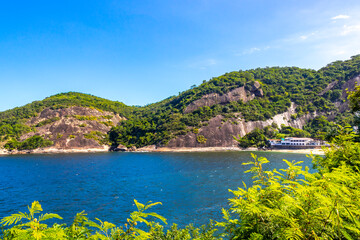 Fototapeta premium Tropical Urca Red Beach Rocks Water Rio de Janeiro Brazil.