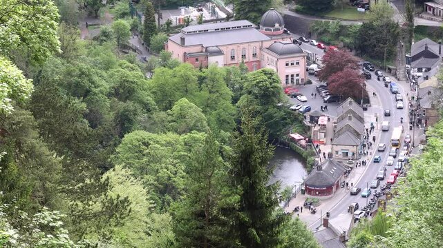 4K footage overlooking Matlock Bath road with traffic on a winding road