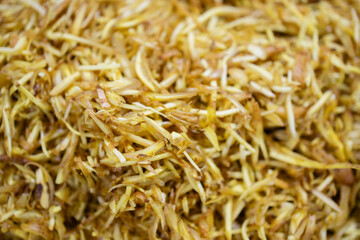 Traditional spice roots are commonly used in Thailand market cooking to add flavor to various vegetables and dishes with authentic taste