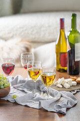 Wine glasses on table top. Luxury home background.