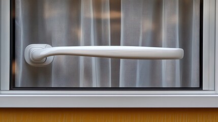 Window with white handle and curtains lets soft light filter in. Use this image for interior design, architecture or home improvement.