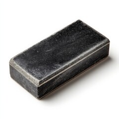 Dark gray rectangular stone object with a light gray border.