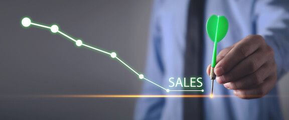 Sales word with a decrease chart. Financial crisis