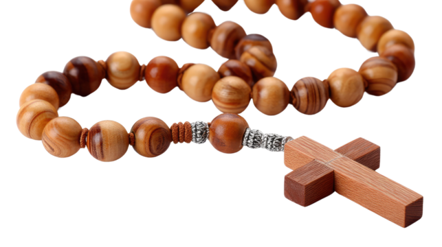 Wooden Rosary Beads: A close-up shot of a traditional wooden rosary with a simple yet elegant cross pendant, showcasing intricate details in the wood grain and beads. 