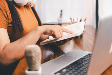Homeschool Asian girl student learning virtual internet online class from school teacher by remote...