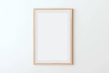 Minimalist wooden frame with a blank white poster on a clean, light wall.