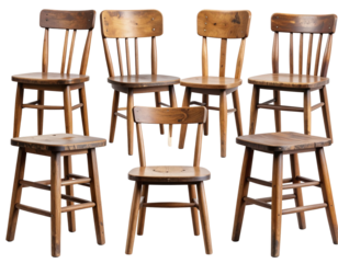 A collection of six rustic wooden chairs, varying slightly in size and showing signs of age and use