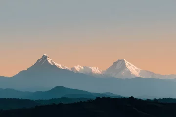 Fotobehang breathtaking view of majestic mountains of nepal during stunning sunset with ultrabright colors illuminating sky © Stefan