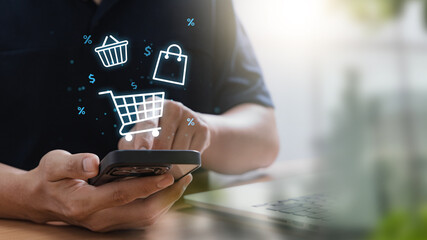 E-commerce and online shopping concept with man using smartphone to browse products and make digital purchases, illustrating mobile commerce, and the shift toward digital retail experiences