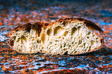 Abstract texture of a slice of bread on corroded patinated steel