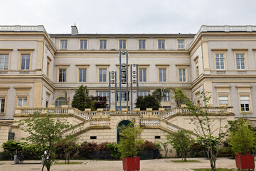 Saint Etienne in France, city center, Ville-Carilon town hall with carillon and forecourt in spring © A.Freund
