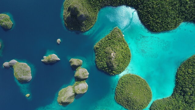 Remote lagoon at Wayag island consisting of limestone islands, Raja Ampat, West Papua, Indonesia