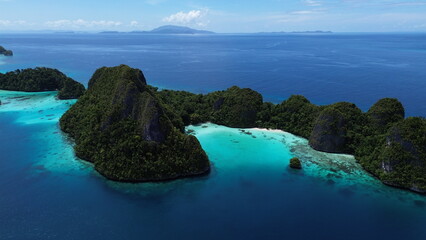Fototapeta premium Remote lagoon at Wayag island consisting of limestone islands, Raja Ampat, West Papua, Indonesia