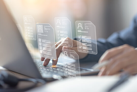 HR professional conducts digital resume screening, reviewing multiple CVs online as part of a modern recruitment process to identify top candidates for corporate roles