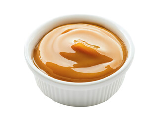 Creamy caramel sauce in white bowl isolated on white background.