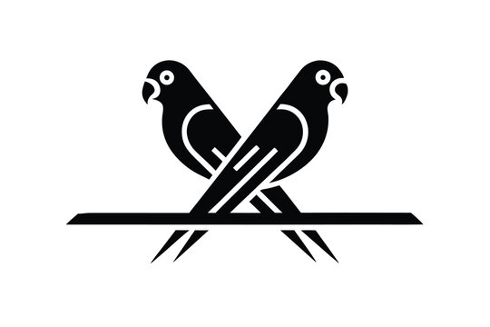 Elegant silhouette of two birds perched on a branch