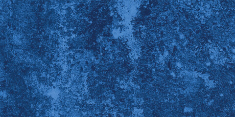 Centralized symbol within a field of deep blue abstract grunge and painterly marks

