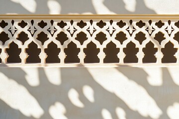 A close-up of the shadows cast by geometric shapes on an empty white wall,