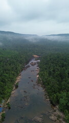 Aerial view of majestic Tatai Waterfall in Koh Kong Province surrounded by dense jungle, Cambodia