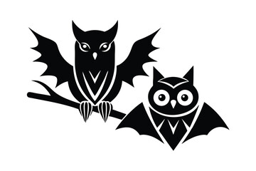 Two halloween owls silhouette one on branch one flying