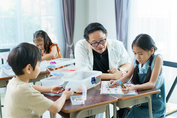 Group of diverse children enjoy learning about the STEM.
