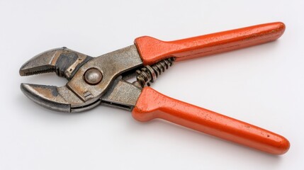 Fototapeta premium Vintage Adjustable Wrench with Red Rubber Grip for Household Repairs and Maintenance Projects