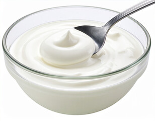 Creamy white yogurt is being swirled in a clear glass bowl with a metal spoon, for breakfast.