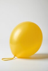 Bright yellow balloon, perfect for celebrations and fun parties.