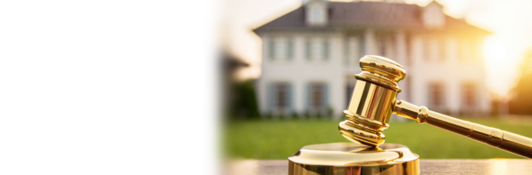 Judge's gavel with house in background for real estate auction banner, property sale, legal decision, law, housing market transactions, homeownership process, copy space, transparent background