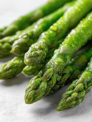 Fresh, vibrant asparagus spears with water droplets