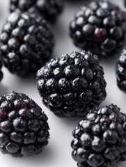 Fresh, vibrant blackberries with water droplets