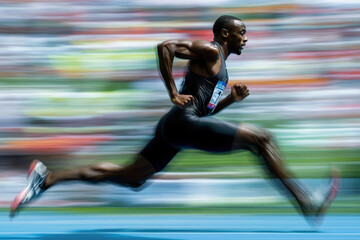 Man running on track.