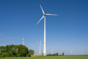 Modern wind turbines in a rural landscape in Germany