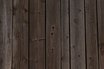 Fototapeta premium These highquality dark wooden planks are ideal for creating beautiful backgrounds or enhancing rustic design themes