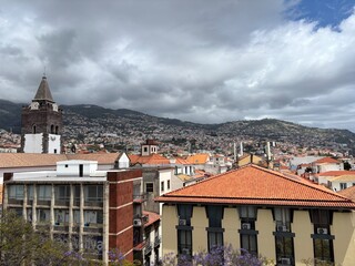 Scenic View of Funchal, Madeira with Coastal Cityscape and Lush Hills