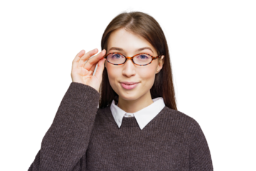 Young woman adjusting stylish glasses, posing confidently in cozy sweater against a clean backdrop