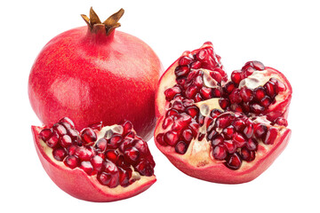 A close up of a whole pomegranate and two pomegranate segments with seeds on a black background