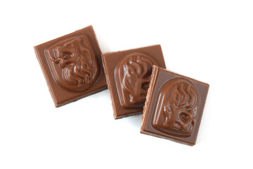 Chocolate pieces on white background