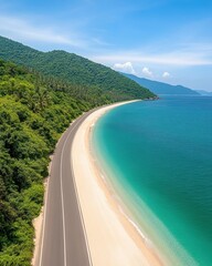 Stunning coastal highway winding along a tropical beach under a clear blue sky in an idyllic natural setting