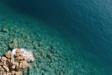 breathtaking aerial view of oceans surface revealing stunning underwater world below