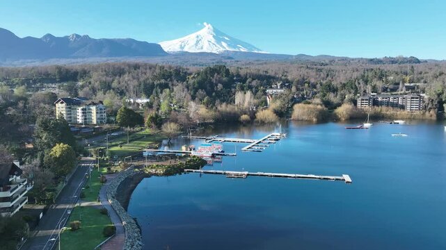 Scenic Lake In Pucon Los Rios Chile. Aerial View Of A Bustling Downtown Cityscape With Modern Buildings. Island Life Landscape Recreation Wanderlust. Summertime Recreation Coast. Pucon Los Rios.
