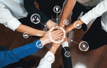 A powerful depiction of collaboration showcasing diverse hands coming together, symbolizing unity...