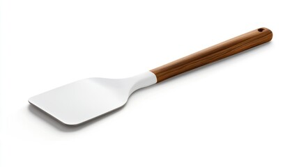Fototapeta premium A white spatula with a wooden handle on a clean, white background.