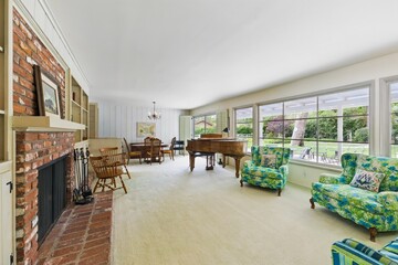 Vintage Mid-Century Home Interiors with Wood Paneling, Built-Ins, and Natural Light