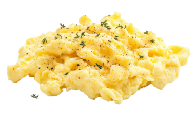 Plate of scrambled eggs with parsley and pepper on top