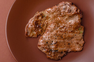 Steak, grilled beef, sirloin cooked on the barbecue with salt and spices