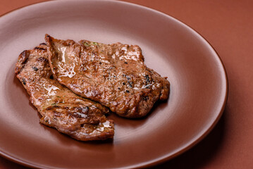 Steak, grilled beef, sirloin cooked on the barbecue with salt and spices
