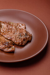 Steak, grilled beef, sirloin cooked on the barbecue with salt and spices