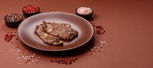 Steak, grilled beef, sirloin cooked on the barbecue with salt and spices
