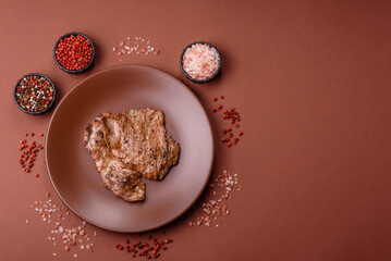 Steak, grilled beef, sirloin cooked on the barbecue with salt and spices